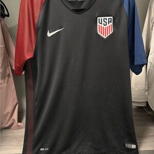 Nike Black Soccer Jersey with Red and Blue Sleeves
